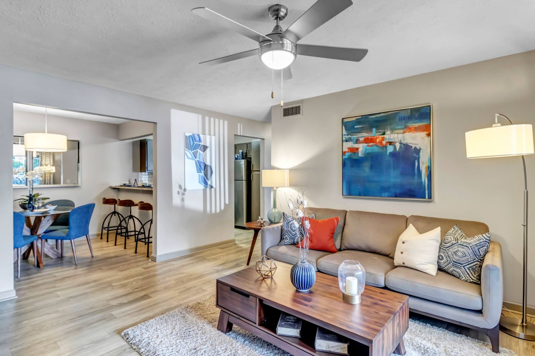 Luxury apartment kitchen with stainless steel appliances, granite countertops, and lots of storage space